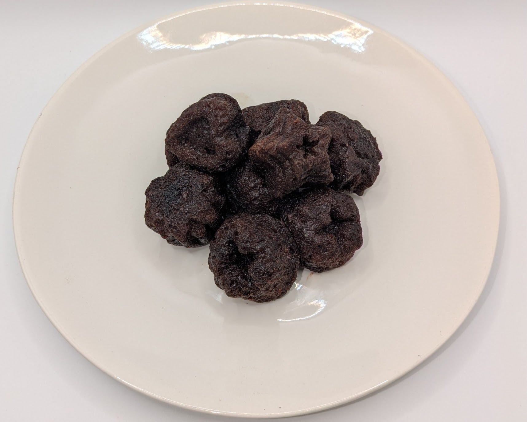 A pile of peppermint schnapps bites on a white plate