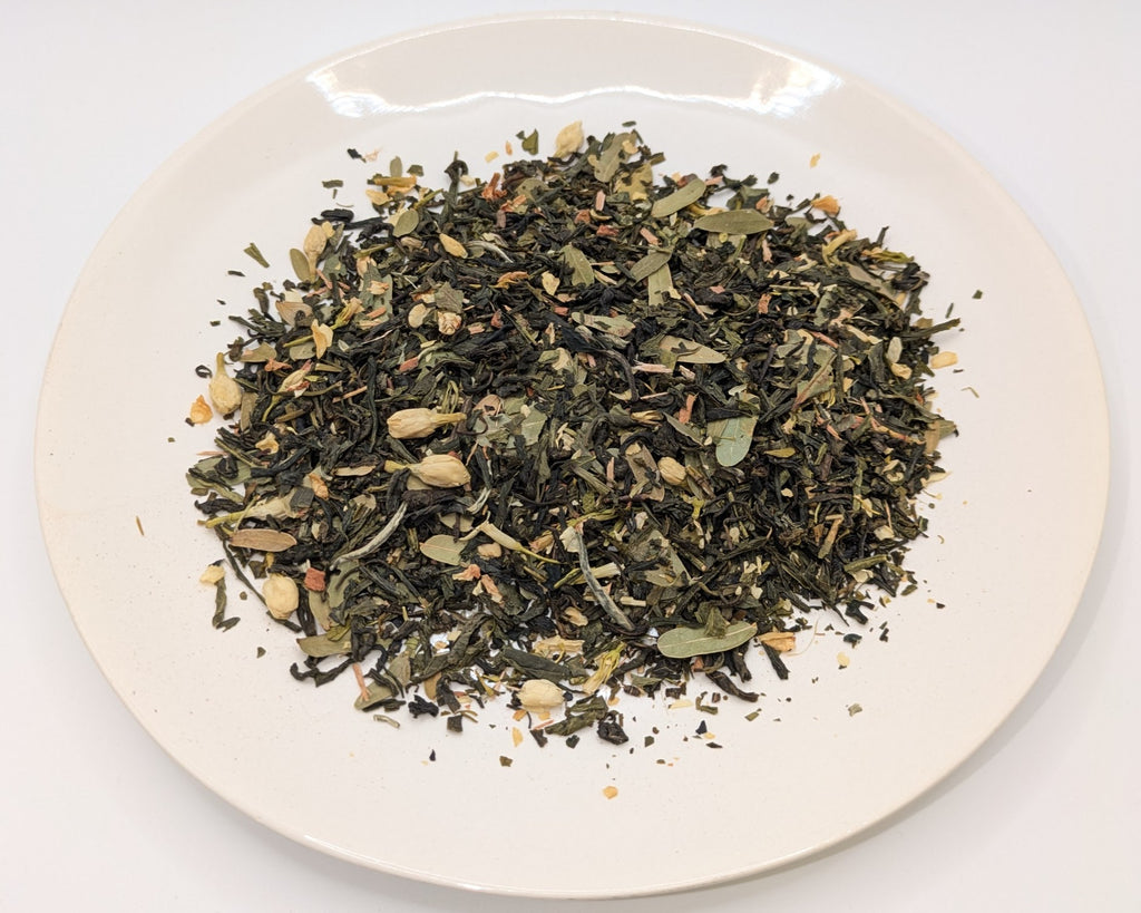 A scoop of Imperial Consort Lychee tea on a white plate