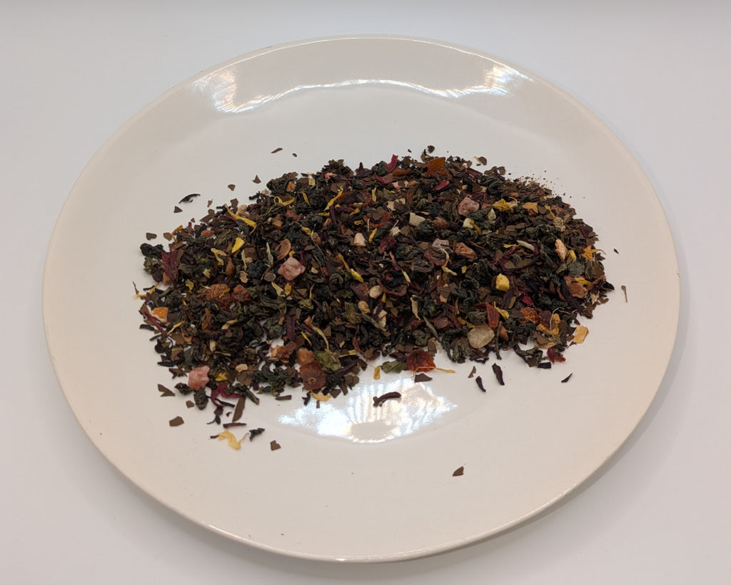 A scoop of majarani chai mate tea on a white plate