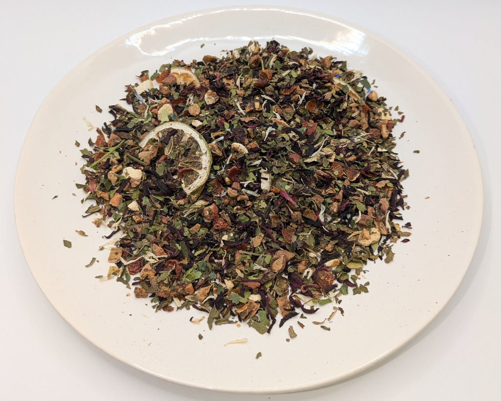 A scoop of Phoebe's Flower Garden tea on a white plate